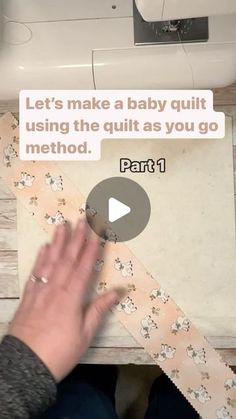 someone is making a baby quilt using the quilt as you go method part 1 video