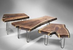 three tables made out of wood and metal legs