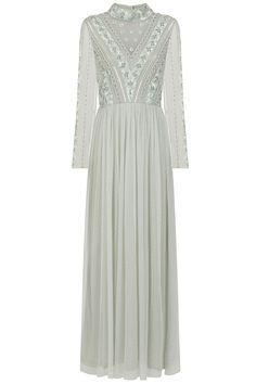 Embellished with a striking chevron of ornate beadwork, the vintage inspired Elaine is an eye-catching and elegant formal style. Overlaid with pale seafoam green mesh, this maxi length gown is designed with a v necked, hem length lining. Elaine is complete with long sleeves and a high neckline. Frock And Frill, Embellished Maxi Dress, Prom Dress Inspiration, Embroidered Maxi Dress, Cape Dress, Dress Inspiration, Abayas Fashion, Dress 16, Formal Style