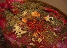 the meat is covered with herbs and spices