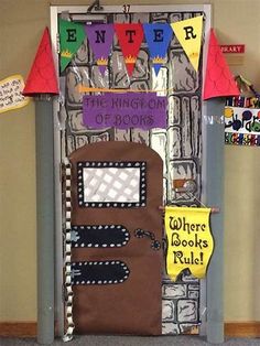 a door decorated with paper cutouts and decorations