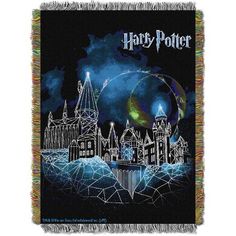 a harry potter tapestry with hogwarts castle and fireworks in the sky above it