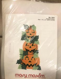 there is a plastic bag with pumpkins on it