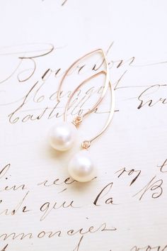 Long Rose Gold Freshwater Pearl Drop Earrings, No. RGHE024 :*About This Piece*: ♦︎ High quality, lustrous cream freshwater pearl drops are hung on long rose gold vermeil earrings. These earrings are elegant and classy with a timeless appeal. ♦︎ Length - 1.7 in (42 mm) ♦︎ Width - .47 in (12 mm) by .4 in (10mm) ♦︎ All items from my shop are packaged in padded cardboard jewelry boxes. Custom gifting options available upon request. ♦︎ Visit my shop for more here: https://www.etsy.com/shop/storygirlc Elegant Rose Gold Pearl Earrings For Gift, Elegant Rose Gold Pearl Earrings As Gift, Classic Rose Gold Pearl Earrings For Parties, Classic Rose Gold Jewelry With Pearl Drop, Classic Rose Gold Hypoallergenic Pearl Earrings, Feminine Rose Gold Pearl Earrings Gift, Delicate Hypoallergenic Rose Gold Pearl Earrings, Classic Hypoallergenic Rose Gold Pearl Earrings, Hypoallergenic Rose Gold Pearl Earrings