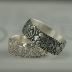 "Silver Wedding Band Wide Floral Ring Aloha Band Hawaiian Ring Polynesian Band Hibiscus Ring Flower Hawaiian Jewelry Polynesian Pattern Band Aloha! We often think of this to mean a simple \"hello\" or \"goodbye,\" but it is so much more. \"Aloha\" directly translates to affection, peace, compassion. It is being one with a larger whole and taking only what you need to survive. This substantial solid .925 sterling silver band features hibiscus flowers and scroll work surrounding the entire band. I Carved Adjustable Jewelry For Wedding, Bohemian Carved Wedding Ring, Traditional Carved Engraved Wedding Ring, Ornate Stamped Jewelry For Wedding, Ornate Stamped Wedding Jewelry, Bohemian Engraved Wedding Ring With Intricate Design, Traditional Carved Rings For Wedding, Bohemian Etched Rings For Wedding, Adjustable Intricate Design Flower Ring For Wedding