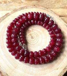 GEMSTONE ---- RUBY SHAPE ---- MELON SHAPE  SIZE ---- 5-9 MM TEXTURE  CARVING  GRADE  AAAA++ HOLE SIZE  0.60 MM BEAUTIFUL STRAND 100% NATURAL RUBY GEMSTONE BEADS WITH HIGH LUSTRE GRADE BEAUTIFULLY CRAFTED ART PIECE WHOLESALE SHOP // WHOLESALE PRICE 100% SATISFACTION GUARANTEED Shipping policy:- Our delivery time is 11-21 days after shipping the goods depending on the location. processing time 1-2 working day after receiving the clear payment. Through Fedex, Ups, Aramex, DHLExpress, India post etc Necklace Size, Ruby Gemstone, Red Ruby, Natural Ruby, Beads Necklace, Necklace Gift, Gemstone Necklace, Melon, Gemstone Beads