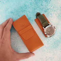 "This beautiful handmade leather watch case is made from veg-tanned calfskin leather. It fully protects your watches from scratches and impacts due to the resilience of this particular leather and its solid structure. The leather piece inside the watch pouch keeps your watch from moving. Keeping your watches in your luggage without protection might lead to disaster! This small and compact watch pouch would be perfect for your travels.  It is such a small and compact watch case that you can even Timeless Leather Watch Accessories With Case, Everyday Round Case Watch With Leather Strap, Timeless Leather Watch Bands As Gift, Leather Watch Accessories With Case, Rectangular, Rectangular Leather Watch Accessories For Everyday Use, Leather Watch Accessories For Everyday Use, Rectangular Leather Watch Bands For Everyday Use, Leather Watch Accessories With Rectangular Case As Gift, Rectangular Leather Watch Bands As Gift