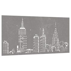 a black and white cityscape with skyscrapers in the night sky canvas wall art print