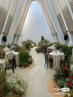 the inside of a restaurant with tables and chairs set up for an outdoor dinner party