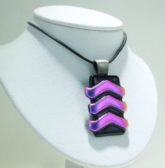 Unique, One-of-a-kind Fuschia & Black Dichroic Pendant. Measures 27 x 45 mm. Comes on adjustable 18-20 inch black cord and gift box. Created by J. Mullins. Unique Black Rectangular Jewelry, Black Necklace With Adjustable Cord As Gift, Dichroic Jewelry, Dichroic Glass Jewelry, Dichroic Pendant, Dichroic Glass Pendant, Fused Glass Pendant, Fused Glass Jewelry, Glass Ideas