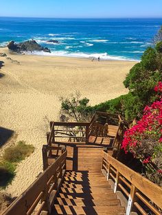 stairs lead down to the beach and ocean