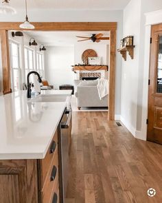 the kitchen is clean and ready to be used as a living room or dining area