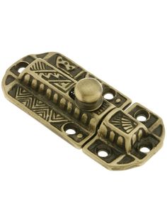 an antique brass plated metal latch with decorative designs on the front and back side