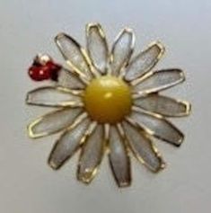 Charming versatile DAISY Brooch  with red Ladybug by 1940s Designer WEISS  ENAMELED on  gold tone metal Fun to wear on clothing and accessories In good vintage condition Vintage Yellow Gold Enamel Pin, Vintage Gold Enamel Brooches, Retro Gold Enamel Brooches, Ladybug Brooch, Cape May Nj, Cape May, Vintage Colors, Gold Tone Metal, Clothing And Accessories