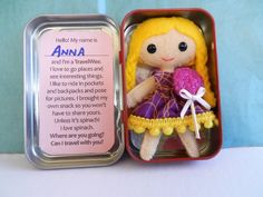 a little doll in a tin with a poem