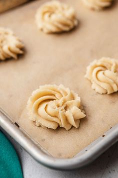 Piped Danish butter cookies on a baking sheet. بيتي فور, Resepi Biskut, Maraschino Cherries, Brownie Desserts, Sicilian Recipes, Almond Paste, Italian Cookies, Almond Cookies, Italian Desserts