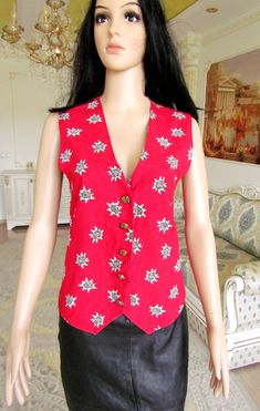 "Edelweiss print Boho Vest Patterned Top womens Vest Vintage FLoral Top FLoral Vest red Vest waistcoats Retro Vest Patterned Vest fitted Vest M 100 % cotton height of the woman in the photo - 180 cm Please refer to photos for details of condition. Condition: used, signs of age and wear see pictures Measurements: Length: 60 cm/ 23.6\" Bust: 95 cm/ 37.4\" Waist 90 cm/35.4 \" Size M note The color on the pictures may vary due to monitor settings and light reflections. Ready to ship Please do not he Fitted Vest With Buttons For Festival, Traditional Fitted Winter Tops, Traditional Fitted Vest For Spring, Newsboy Hat Women, Patterned Vest, Retro Vest, Fitted Vest, Vintage Floral Top, Floral Vest