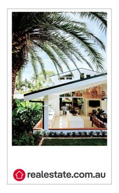 an advertisement for real estate australia showing the inside of a house with palm trees in front of it