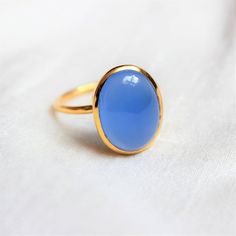 D E T A I L S - Material:  Sterling silver 925Stone:      Blue ChalcedonyThe fit:     True to US ring size Finish:      Smooth and Gold Plated to a high shineS H I P P I N G & P R O D U C T I O N - My current production time is 2-6 business days, which means after those days are up, your order ships! I make everything custom to order, by hand, but I promise you it's worth the wait!R U S H - M Y - O R D E R -If you're in a rush to get your pretty new pieces, please send me a message and I'll Blue Chalcedony Ring, Aqua Chalcedony Ring, Ring Everyday, Ring Proposal, Chalcedony Ring, Kahlil Gibran, Everyday Ring, Beaded Jewelry Tutorials, Textured Ring