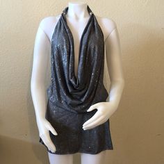 Women’s Sexy Low Cut Club Dress. Silver/Grey. Size S. Smoke Free Home. Never Worn. Like New. You Adjust The Top With The Silver Rings Shown In Last Picture. Gray V-neck Mini Dress For Date Night, Chic Stretch Gray Mini Dress, Chic Gray Stretch Mini Dress, Gray Sleeveless Mini Dress For Night Out, Glamorous Mini Tops For Night Out, Gray Summer Party Top, Gray Summer Party Tops, Summer Party Gray Top, Gray Stretch Mini Dress For Party