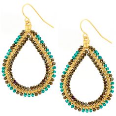 Exquisitely handmade, this gorgeous gold set of earrings is perfectly constructed with colorful beads and a classic teardrop shape. Parallel rows of Czech glass beads outline the gold teardrop shape for a fair-trade pair that encompasses handcrafted, one-of-a-kind beauty with charming simplicity. Gold-plated metal & Czech glass beads 2" drop x 1.2" W (5 x 3 cm) Handmade in & fairly-traded from Brazil Beaded Teardrop Earrings, Paw Print Jewelry, Spirit Clothing, Fair Trade Clothing, Ribbon Jewelry, Fair Trade Jewelry, Printed Jewelry, Flip Flop Shoes, Purple Teal