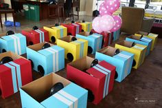 many boxes are lined up with balloons in them