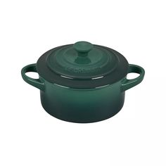 a green pot with a lid on it