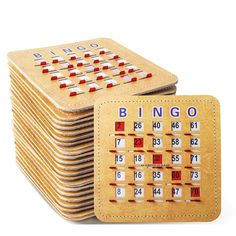 a stack of wooden domino boards sitting on top of each other