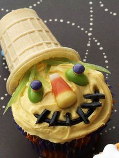 cupcakes with frosting and icing decorated to look like an ice cream cone