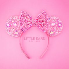 Introducing our Sparkle Mickey Ears – the epitome of elegance and magic! Meticulously handcrafted with passion and precision, each pair is a true work of art. Every stone and embellishment is delicately placed by hand, ensuring the highest quality and attention to detail. Crafted from the finest materials including resin and glass stones, these ears dazzle with a sparkle that turns heads wherever you go.HIGHLIGHTS • Our Sparkle Mickey Ears can fit both adults and kids aged seven and above comfortably. • Each stone is carefully placed by hand by one of our artisians. • A bit heavier than our normal ears but comfortable enough to be worn all day without causing headaches or discomfort. • Constructed with top-notch materials including glass and resin rhinestones, satin or PVC Bow and acrylic Pvc Bow, Mini Mouse Ears, Disney Poses, Disney Ears Headband, Disneyland Christmas, Disney Mickey Ears, Christmas Cups, Halloween Cups, Mouse Ears Headband