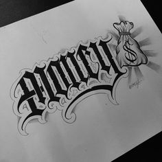 the word tattoo written in black and white ink with a crown on top of it