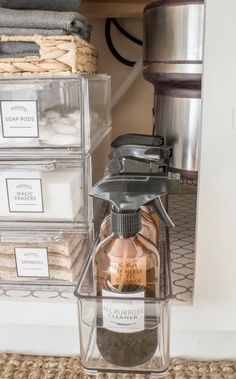 a kitchen cabinet filled with spices and other items