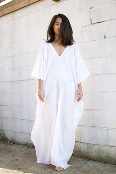 COTTON GAUZE kaftan White CaftanKaftan see throughLong | Etsy White Flowy V-neck Cover-up, White Free Size Maxi Dress For Beach Cover-up, White Tunic Dresses For Beach Season, White Tunic Dress For Beach Party, Short Sleeve Summer Kaftan For Daywear, White Short Sleeve Kaftan For Summer, White Tunic Beachwear Dress, Summer Tunic Maxi Dress For Daywear, White Short Sleeve Summer Kaftan