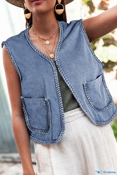 OrcaJump - Stylish Ashleigh Denim Vest with Blue Braided Trim and Convenient Pockets Fall Washed Blue Denim Vest, Blue Cotton Denim Vest With Pockets, Denim Blue Cotton Vest With Pockets, Summer Blue Denim Vest With Pockets, Blue Denim Vest With Pockets For Summer, Fall Washed Blue Denim Top, Spring Blue Washed Denim Vest, Indigo Denim Top With Pockets, Blue Washed Denim Vest For Spring