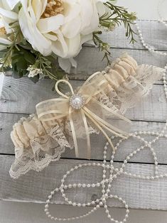 Ivory Lace Bridal Garter Set Beautiful garter in ivory lace and a pearl accent Sale is final, but 100% satisfaction guaranteed. Please contact us if there are any issues with your purchase. Lace Garter Set, Bridal Garter Lace, Wedding Garter Lace, Bridal Garters Set, Lace Garter, Wedding Garter Set, Garter Set, Bridal Garter, Wedding Garter