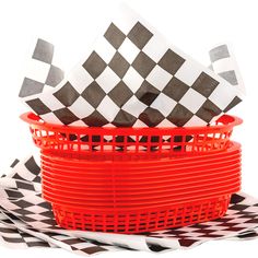 red basket with black and white checkered paper napkins