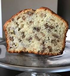 a piece of bread sitting on top of a metal plate