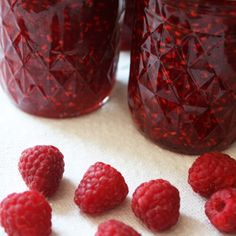 raspberry jam in jars with fresh raspberries