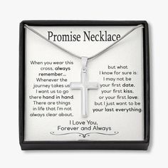 a necklace with a cross and poem on it