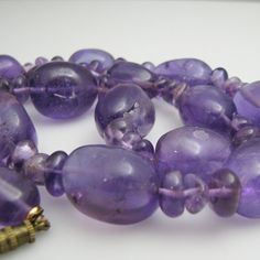 "For sale: (1) d950 Amethyst Necklace PLEASE READ ENTIRE DESCRIPTION BEFORE PURCHASING Pre-owned item. Good condition. Please see pictures for details. Sold as is, as seen on pictures. This necklace is stamped. Specifics: Screw clasp Length: 23.5 inches Width: 17 mm Total Weight: 124.5 grams Please be 100% sure of your purchase before buying, as we do not offer refunds. We are more than happy to provide any specific pictures, or answer any questions you have regarding our items. All jewelry is c Formal Amethyst Gemstone Bead Necklace, Formal Purple Amethyst Necklace, Collectible Amethyst Purple Necklace, Collectible Amethyst Necklace In Purple, Collectible Purple Amethyst Necklace, Purple Amethyst Necklace For Collectors, Classic Hallmarked Amethyst Necklace, Classic Amethyst Purple Necklace, Classic Purple Amethyst Necklace