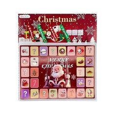 a christmas calendar with santa claus and other holiday items on the front, including candy bars