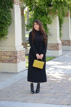 Modest Black Maxi Dress For Formal Occasions, Black Maxi Dress With Side Slits For Work, Black Maxi Dress With Side Slits For Fall, Black Dress With Side Slits For Work, Black Workwear Dress With Side Slits, Black Work Dresses With Side Slits, Black Belted Maxi Dress For Fall, Fall Workwear Midi Dress With Side Slits, Sleek Black Maxi Dress For Fall