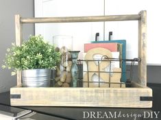 a shelf filled with assorted items on top of a counter next to a potted plant