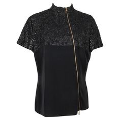 Dior - (Made in Italy) Embroidered black silk top with a silk lining. 44FR size indicated. Additional information: Condition: Good condition Dimensions: Shoulder width: 41 cm - Chest: 50 cm - Sleeve length: 18 cm - Length: 62 cm Seller Reference: FH136 Black Silk Top, John Galliano, Embroidered Silk, Silk Top, Black Silk, Blouse Top, Silk Blouse, Made In, Christian Dior