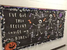 a chalkboard with skeletons and music notes on it that says i've got this feeling inside my bones