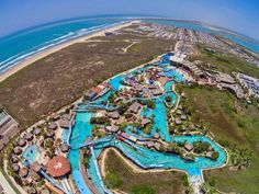 an aerial view of the water park and beach