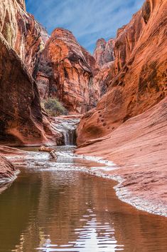 the water is running through the narrow slot in the canyon, and it's clear