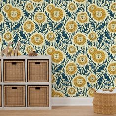 the wallpaper in this room is decorated with yellow and blue flowers, which are surrounded by wicker baskets