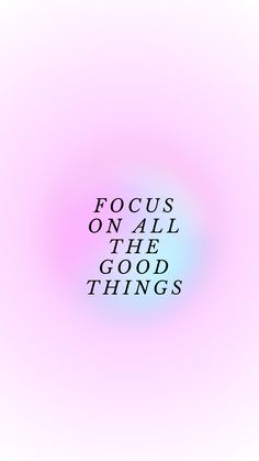 the words focus on all the good things are shown in black and white letters against a pink background