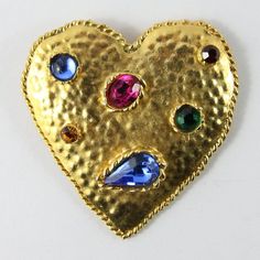 "Vintage Signed 'Edouard Rambaud Paris' Heart-Shaped Brooch With Multi-Coloured Crystals Dimensions: Length: 5.5cm (2.1\"), Width 5cm (1.9\") Materials: Gold Plated, Mixed Metals, Crystals  Features: Multi-Coloured Crystals (Blue, Green, Orange, Red, Pink) Era: c. 1970's Condition: Excellent Type: Brooch Signed Eduard Rambaud" Pink Era, Runway Earrings, Crystals Blue, Vintage Designer Bags, Light Weight Jewelry, Faux Pearl Earrings, Blue Green Orange, Heart Brooch, Cat Earrings